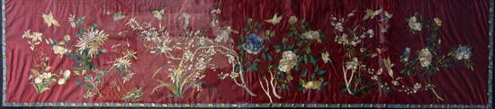 A large Chinese burgundy silk table frontal, early 20th century, 45 x 198cm